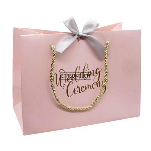 100pcs High-quality gifts Bow gift bag Portable paper bag Wedding supplies Tote bag wrapping paper bags with handle